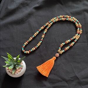 Hand assembled beaded necklace antique green round gemstone